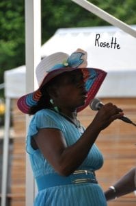 rosette giving speech during Mercy Ships dress ceremony