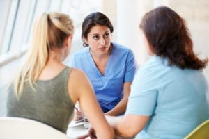 female healthcare professional in a negotiation meeting