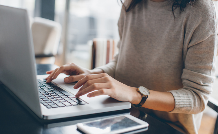 Woman using her laptop