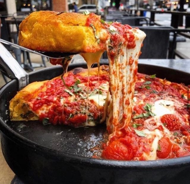 Cheese pull at Ginos East Chicago